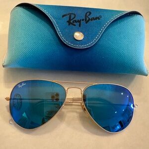Matte gold ray ban aviator with blue reflective lenses